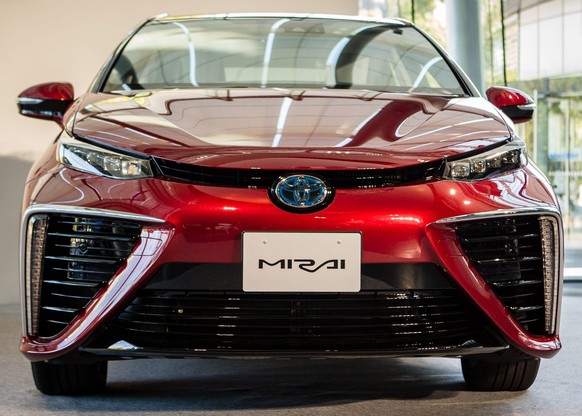 epa04493906 Toyota Motor Corporation&#039;s all-new fuel cell vehicle (FCV) sedan called &#039;Mirai&#039; which means future in Japanese, is shown on display during an unveiling ceremony in Tokyo, Ja ...