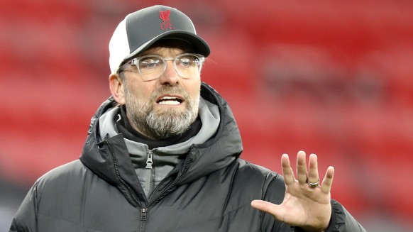 Liverpool&#039;s manager Jurgen Klopp gestures during the Champions League round of 16, first leg, soccer match between RB Leipzig and Liverpool at the Ferenc Puskas stadium in Budapest, Hungary, Tues ...