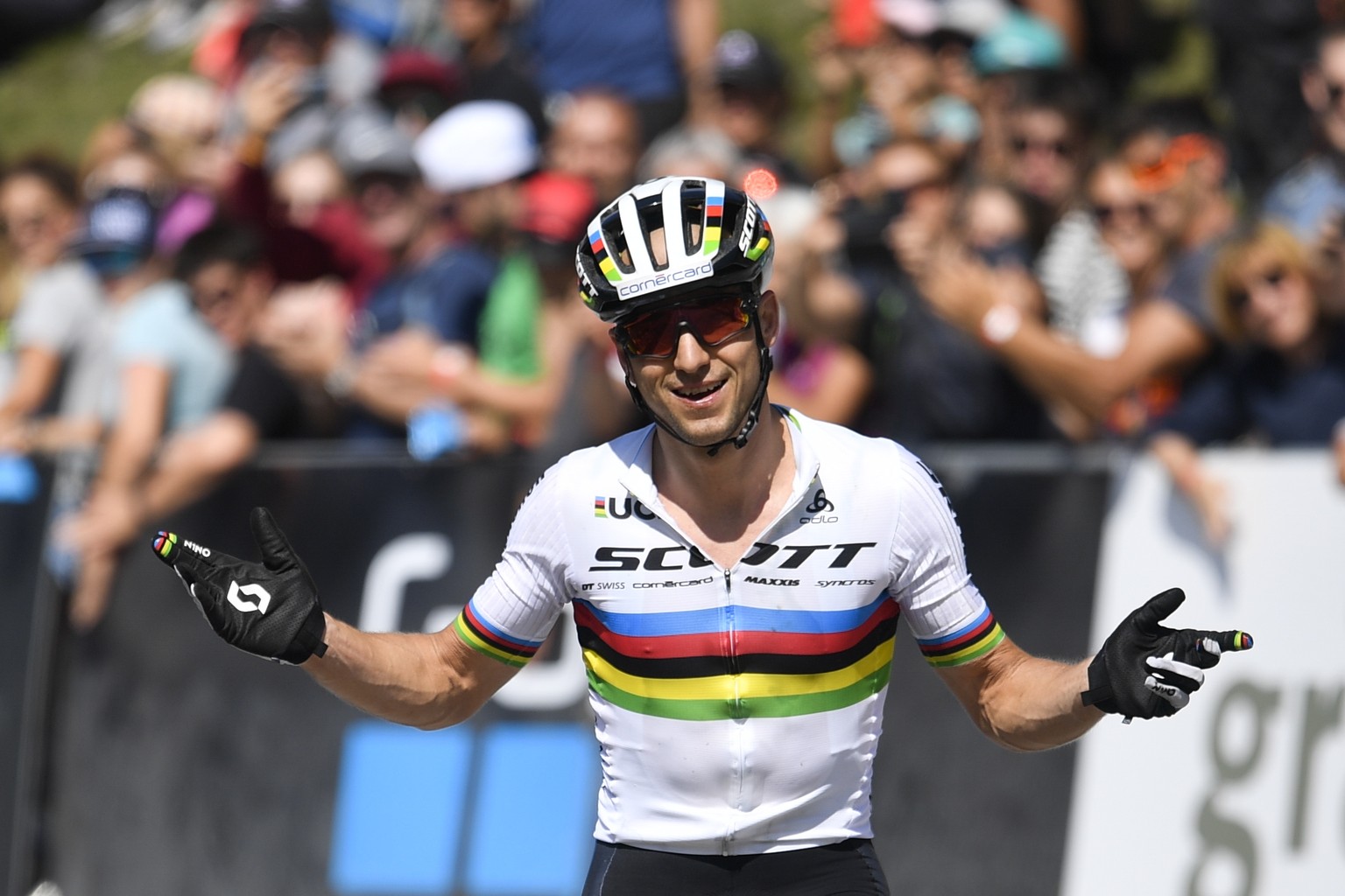 epa07768262 Second placed Nino Schurter of Switzerland reacts after the UCI Cross Country Mountain Bike World Cup race in Lenzerheide, Switzerland, 11 August 2019. EPA/GIAN EHRENZELLER