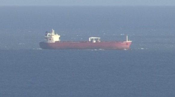 In this image taken from SKY video, shows a tanker at sea, as filmed from land on Sunday Oct. 25, 2020. British police are investigating an undisclosed incident aboard an oil tanker in the English Cha ...