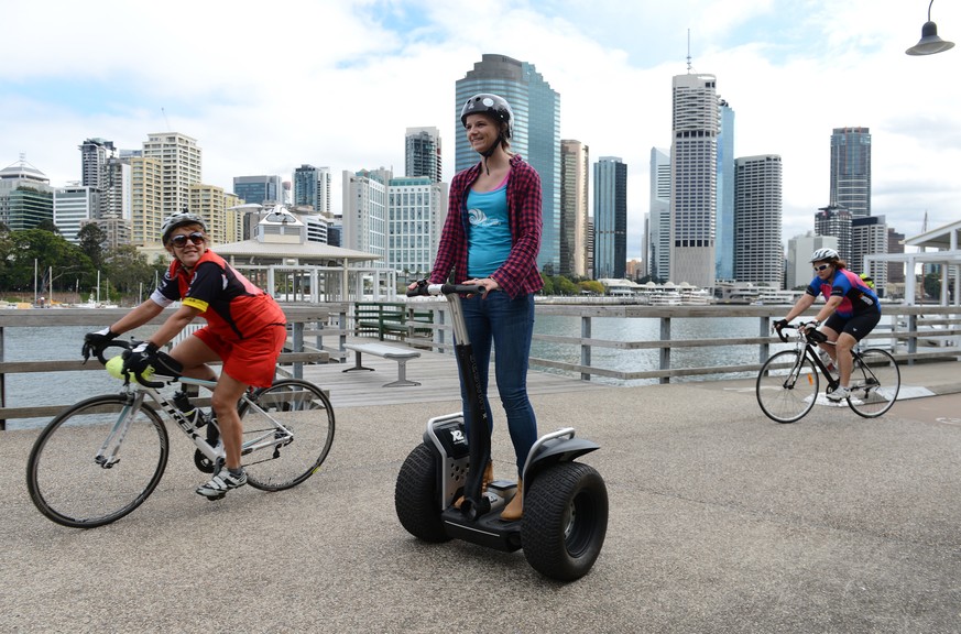epa08507913 (FILE) - Hanna Timmer rides a segway on a public bikeway in Brisbane, Australia, 01 August 2013 (reissued 25 June 2020). Segway will end production of its model Personal Transporter (PT) o ...