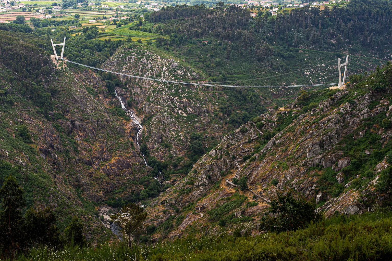 epa08464250 View of the &#039;516 Arouca&#039; considered the largest suspension pedestrian bridge in the world with 516 meters long and 175 meters high in Arouca, Portugal, 03 June 2020 (issued on 04 ...