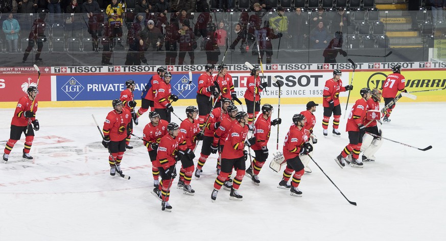 SC Bern players react after winning the game (3-2) during the Champions Hockey League group F match between Switzerland&#039;s SC Bern against Vaexjoe Lakers in Bern, Switzerland, this Tuesday, Decemb ...