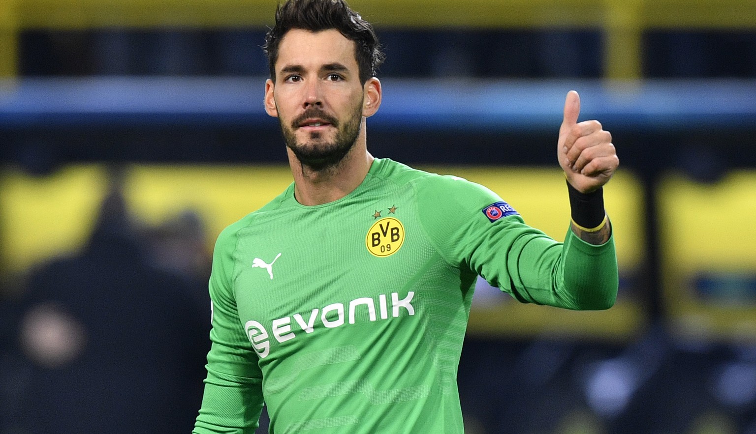 Dortmund goalkeeper Roman Buerki gestures to supporters after the Champions League group A soccer match between Borussia Dortmund and Club Brugge in Dortmund, Germany, Wednesday, Nov. 28, 2018. (AP Ph ...