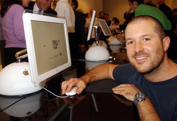 Jonathon Ive, vice president of industrial design at Apple Computers, with one of his inspired designs, the apple I-Mac which won him the innaugural designer of the year award, and a cheque for £25,00 ...