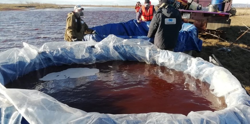 epa08465326 A handout picture made available 04 June 2020 by the press service of the Marine Rescue Service of Russia (MRS or Morspassluzhba in Russian) shows rescuers working at the site of oil produ ...