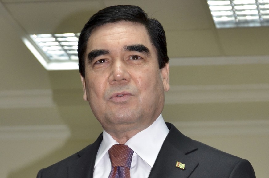 FILE - In this file photo taken on Sunday, Feb. 12, 2017, Turkmenistan President Gurbanguly Berdimuhamedov speaks to journalists after casting his ballot at a polling station in Ashgabat, Turkmenistan ...