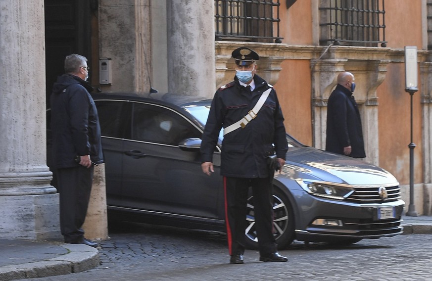 epa08966402 Outgoing premier Giuseppe Conte (unseen) leaves in a car from Palazzo Giustiniani after an interview with the President of the Senate Maria Elisabetta Alberti Casellati, in Rome, Italy, 26 ...