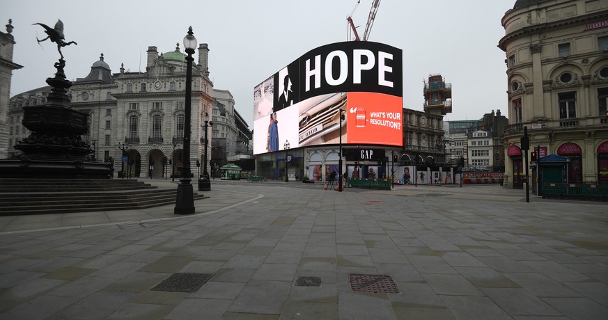 epa08930010 An advertisement showing the word &quot;Hope&quot; is on display at Piccadilly Circus in London, Britain, 10 January 2021. England has entered the third lockdown since the start of the pan ...