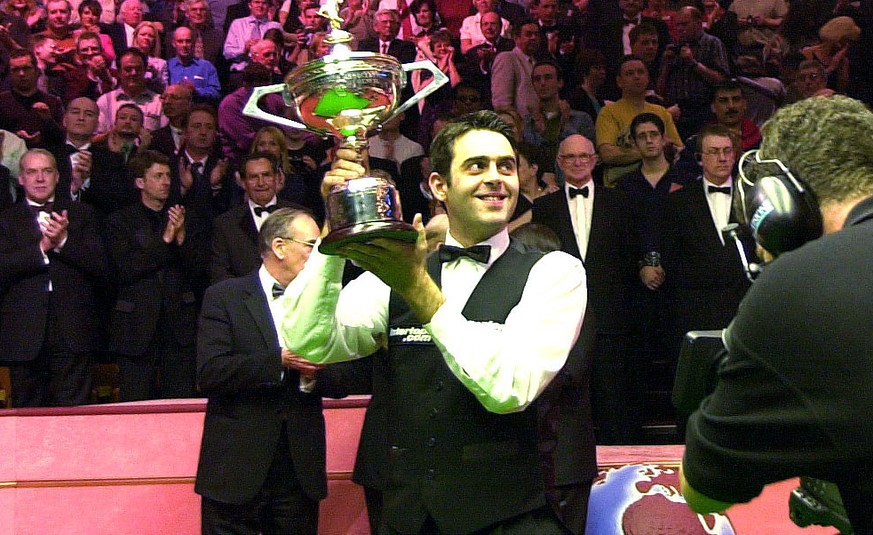 7 May 2001: Ronnie O&#039;sullivan of England shows off the trophy after beating John Higgins to win the final of the Embassy World Championship Snooker Finals at the Crucible Theatre, Sheffield. DIGI ...