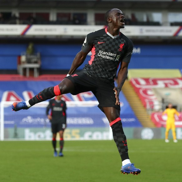 Liverpool&#039;s Sadio Mane celebrates after scoring his side&#039;s second goal during the English Premier League soccer match between Crystal Palace and Liverpool at Selhurst Park stadium in London, ...
