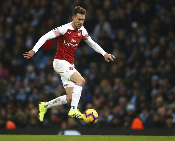 Arsenal&#039;s Aaron Ramsey controls the ball during the English Premier League soccer match between Manchester City and Arsenal at Etihad stadium in Manchester, England, Sunday, Feb. 3, 2019. (AP Pho ...