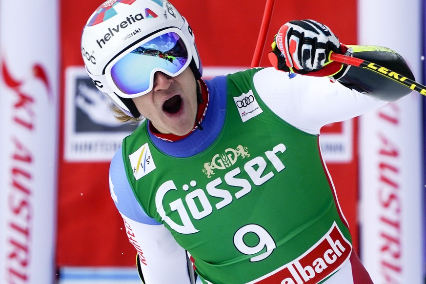 Switzerland&#039;s Marco Odermatt celebrates at the finish area of an alpine ski, men&#039;s World Cup super G, in Saalbach-Hinterglemm, Austria, Sunday, March 7, 2021. (AP Photo/Giovanni Auletta)