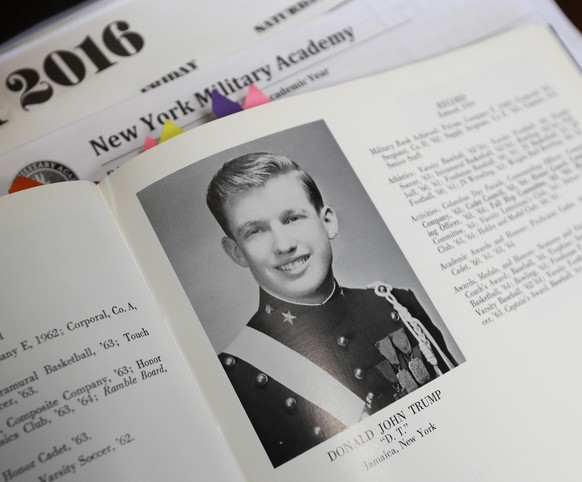 In this Thursday, Sept. 8, 2016 photo, Donald Trump is shown in the 1964 Shrapnel yearbook at the New York Military Academy in Cornwall-on-Hudson, N.Y. While Republican presidential nominee, Trump, ta ...