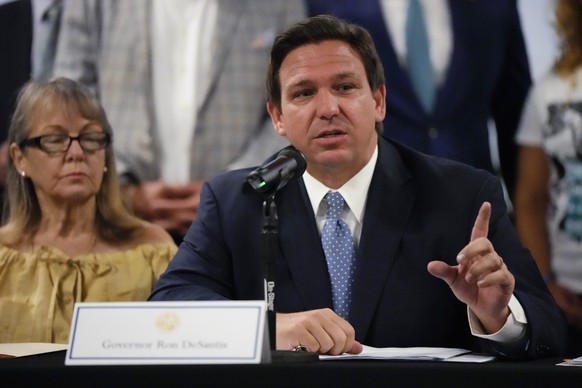 Florida Gov. Ron DeSantis speaks to journalists following a round table on Cuba, Tuesday, July 13, 2021, at the American Museum of the Cuban Diaspora in Miami.(AP Photo/Rebecca Blackwell)