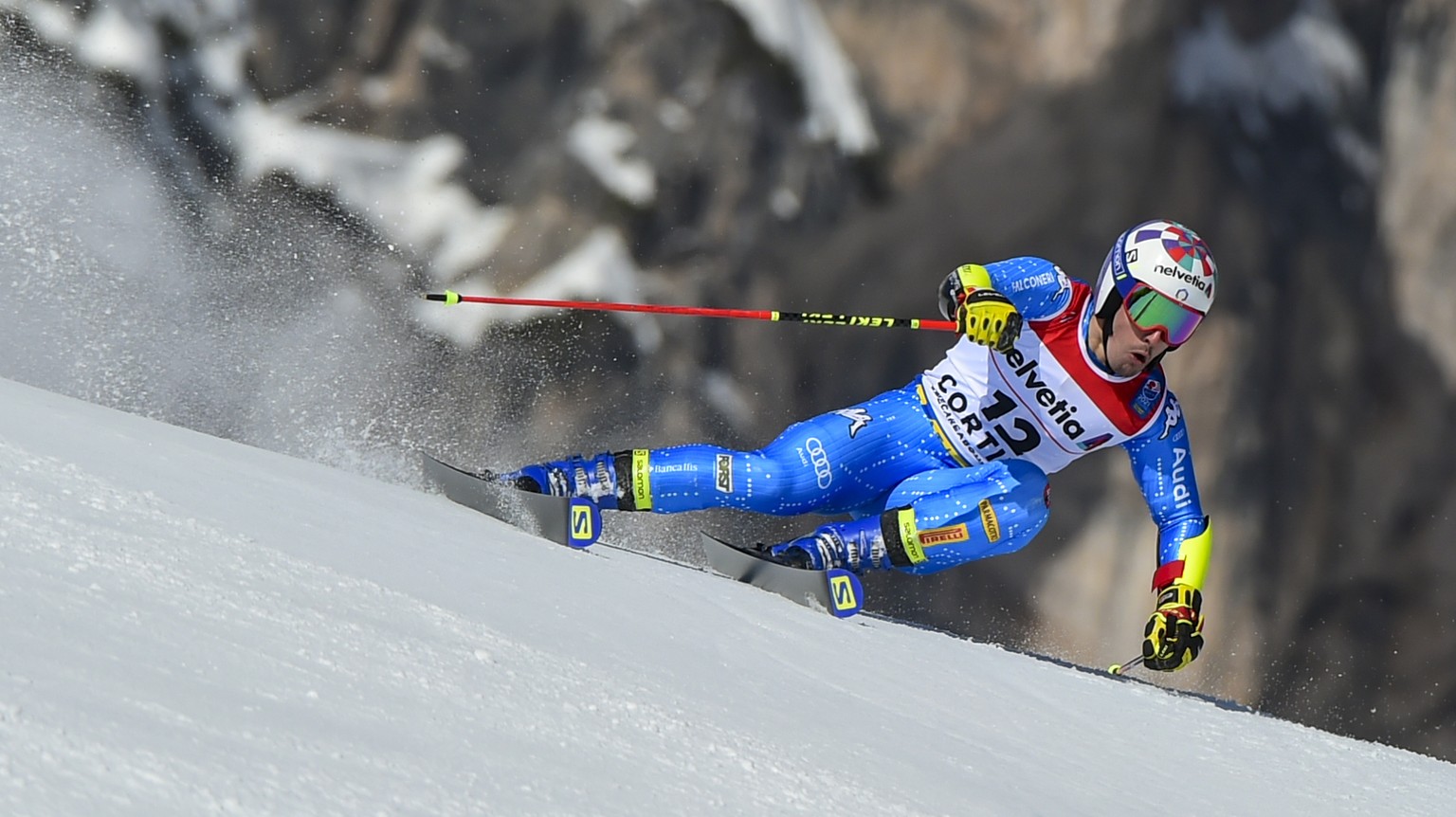 Italy&#039;s Luca De Aliprandini speeds down the course during a men&#039;s giant slalom, at the alpine ski World Championships, in Cortina d&#039;Ampezzo, Italy, Friday, Feb. 19, 2021. (AP Photo/Marc ...
