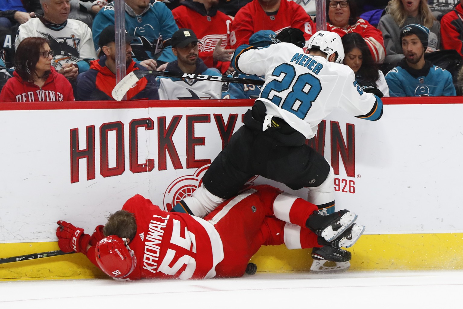 San Jose Sharks right wing Timo Meier (28) checks Detroit Red Wings defenseman Niklas Kronwall (55) in the first period of an NHL hockey game Sunday, Feb. 24, 2019, in Detroit. (AP Photo/Paul Sancya)