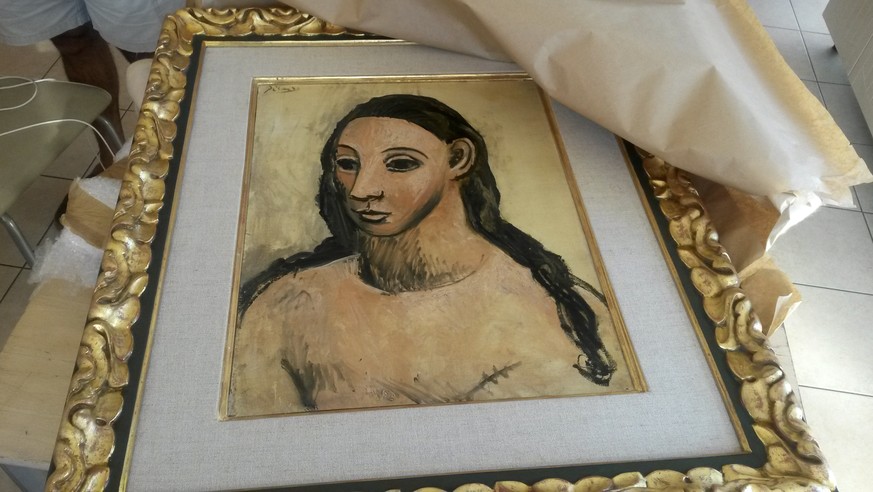 This photo taken on Friday, July 31, 2015 and made available on Tuesday, Aug. 11, 2015 by French Customs shows a 24 million-euro ($27.4 million) masterpiece by Pablo Picasso, seized from a boat cargo  ...