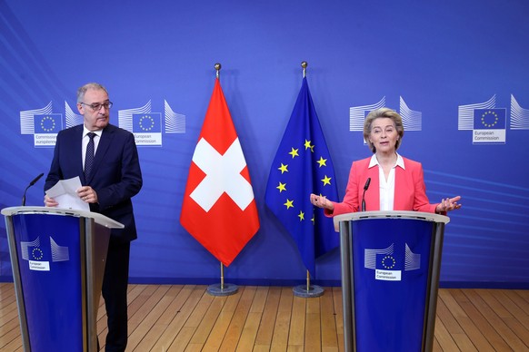 epa09154266 European Commission President Ursula Von der Leyen (R) and Swiss President Guy Parmelin hold a press conference during their meeting at the European Commission building in Brussels, Belgiu ...