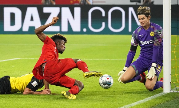 epa07755429 Bayern Munich&#039;s Kingsley Coman (L) in action against Dortmund&#039;s goalkeeper Marwin Hitz (R) during the German Supercup soccer match between Borussia Dortmund and Bayern Munich in  ...