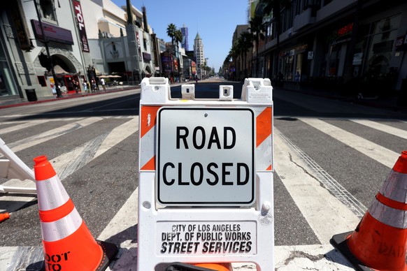 epa08623401 A road sign closes off the section of Hollywood Boulevard where the All Black Lives Matter mural is in Hollywood, California, USA, 24 August 2020. Los Angeles City Councilmember Mitch O?Fa ...
