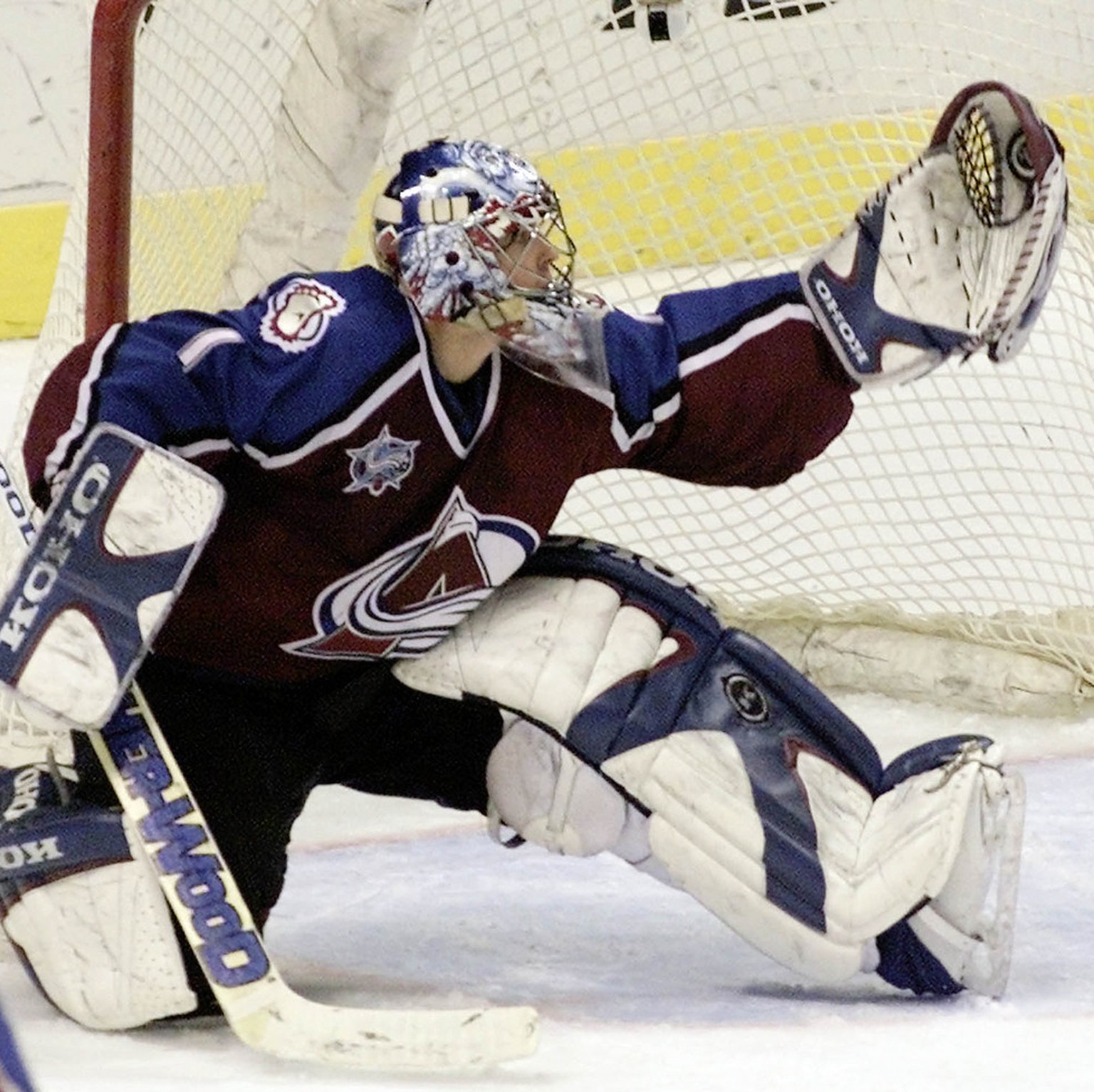 Colorado Avalanche goalie David Aebischer makes a glove save on a slap shot from St. Louis Blues&#039; Al MacInnis in the second period Thursday, March 22, 2001, at the Savvis Center in St. Louis. (KE ...