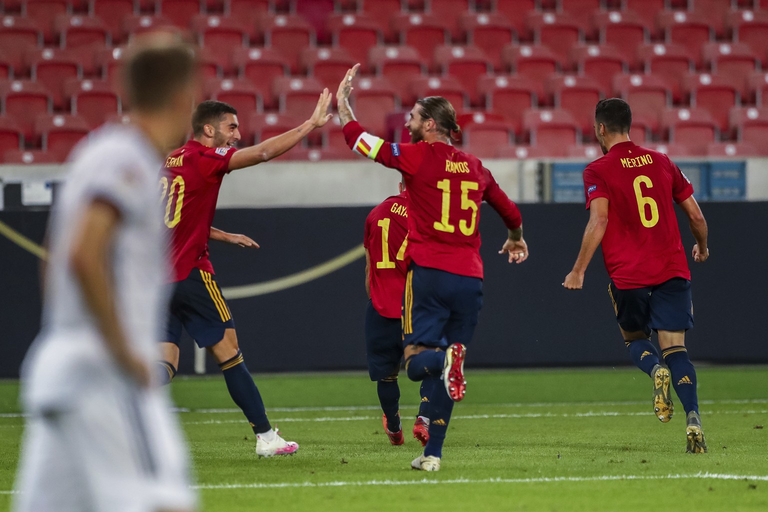Spain players celebrate after scoring during the UEFA Nations League soccer match against Germany at the Mercedes-Benz Arena stadium in Stuttgart, Germany, Thursday, Sept. 3, 2020. (AP Photo/Matthias  ...