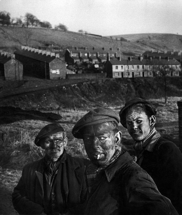 UNITED KINGDOM - FEBRUARY 01: Three Welsh coal miners just up from the pits after a day&#039;s work in coal mine in Wales. (Photo by W. Eugene Smith/The LIFE Picture Collection via Getty Images)