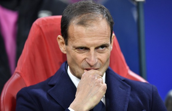 FILE - In this Wednesday, April 10, 2019 filer, Juventus coach Massimiliano Allegri stands on the touchline before the Champions League quarterfinal, first leg, soccer match between Ajax and Juventus  ...