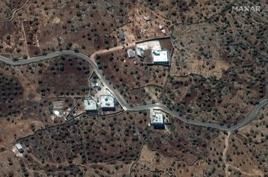 epa07954022 A handout photo made available by Maxar 27 October 2019 shows a satellite image taken 28 September 2019 of the reported residence of the former ISIS leader, Abu Bakr al-Baghdadi in northwe ...