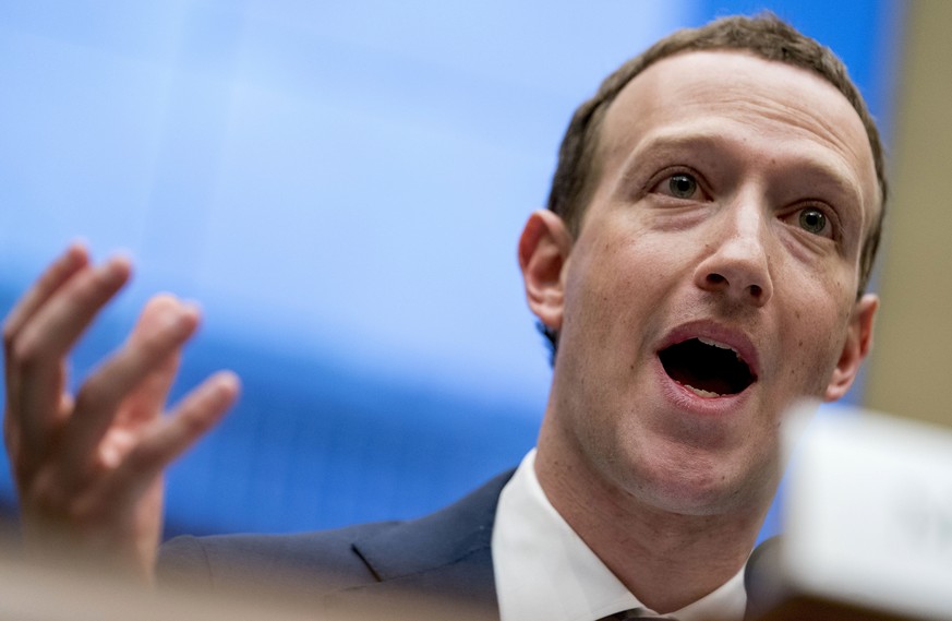 FILE - In this April 11, 2018, file photo Facebook CEO Mark Zuckerberg testifies before a House Energy and Commerce hearing on Capitol Hill in Washington. Twitter&#039;s ban on political advertising i ...