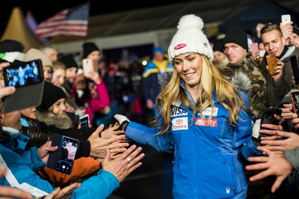Mikaela Shiffrin of USA, the winner, reacts during the podium ceremony of the women&#039;s Super-G race at the FIS Alpine Ski World Cup, in St. Moritz, Switzerland, Saturday, December 8, 2018. (KEYSTO ...
