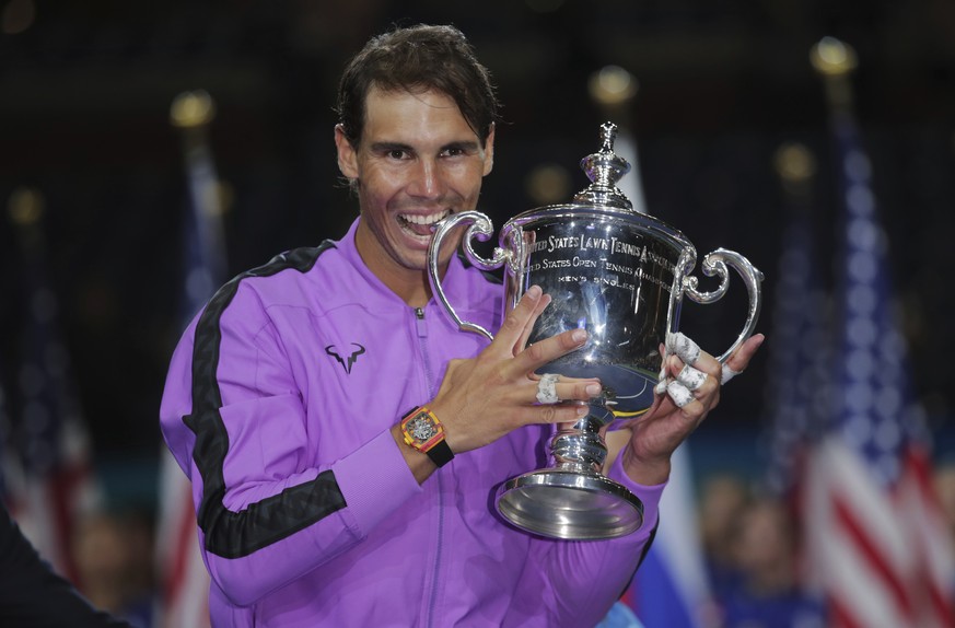 Rafael Nadal, of Spain, poses with the championship trophy after defeating Daniil Medvedev, of Russia, to win the men&#039;s singles final of the U.S. Open tennis championships Sunday, Sept. 8, 2019,  ...