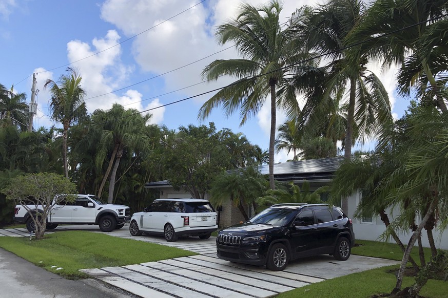 Vehicles are parked in the driveway of house belonging to President Donald Trump&#039;s former campaign manager Brad Parscale, Monday, Sept. 28, 2020, in Fort Lauderdale, Fla. Florida police and campa ...