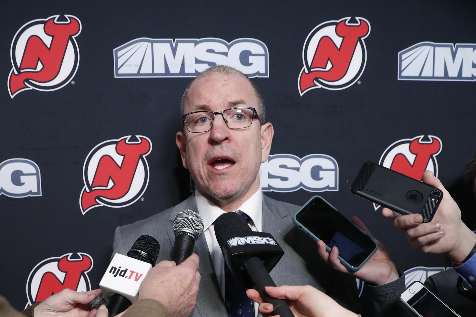 New Jersey Devils interim general manager Tom Fitzgerald anwers reporters&#039; questions after the Devils announced that captain Andy Greene was traded to the New York Islanders, Sunday, Feb. 16, 202 ...