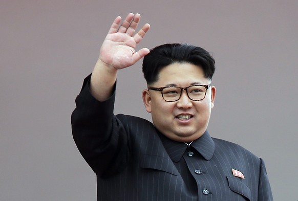 FILE - In this May 10, 2016 file photo, North Korean leader Kim Jong Un waves at parade participants at the Kim Il Sung Square in Pyongyang, North Korea. Kim has overseen a ground test of a new rocket ...