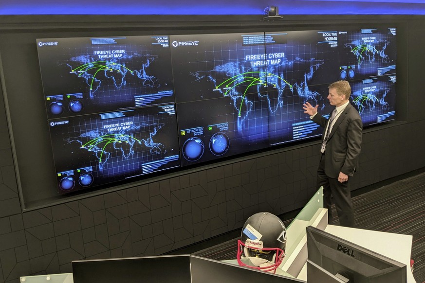 The CEO of FireEye Kevin Mandia gives a tour of the cybersecurity company&#039;s unused office space in Reston, Va., Tuesday, March 9, 2021. Mandia said 550 of his employees are working remotely and r ...
