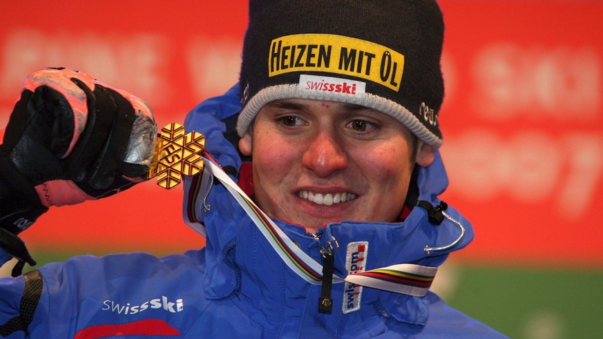 Daniel Albrecht of Switzerland celebrates during the medal ceremony of the men&#039;s combined slalom event at the Alpine Skiing World Championships in Aare, Sweden, Friday 09 February 2007. Daniel Al ...