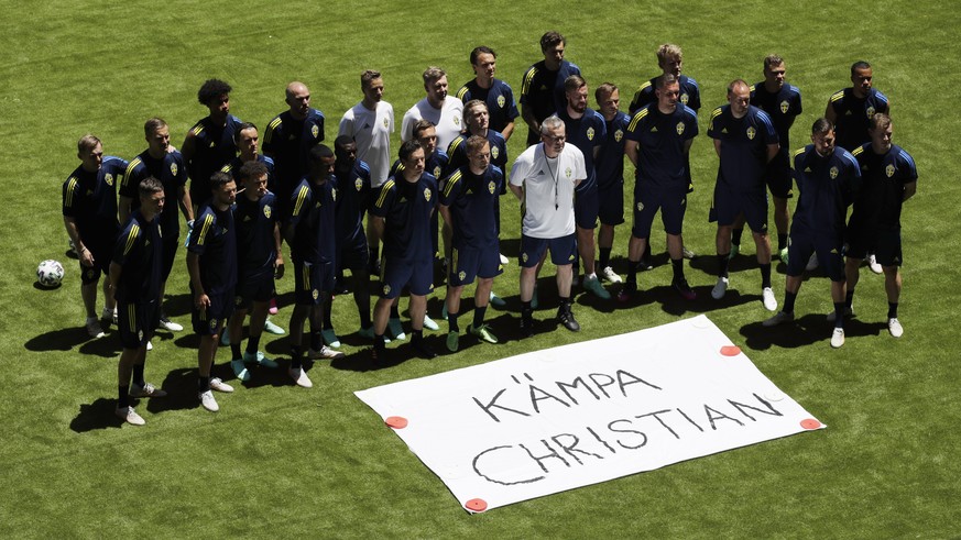 epa09267135 Players of Sweden send a message (Fight Christian) to Danish player Christian Eriksen before a training session in Seville, Spain, 13 June 2021. Spain will face Sweden in their UEFA EURO 2 ...