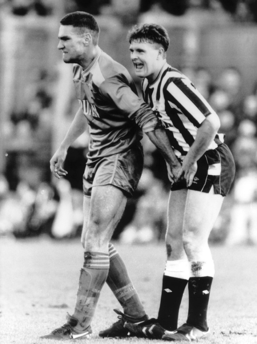Football - Division One 87/88 - Newcastle United v Wimbledon - St James Park - 5/9/87 Newcastle&#039;s Paul Gascoigne is grabbed in the shorts by Wimbledon&#039;s Vinnie Jones Mandatory Credit: Action ...