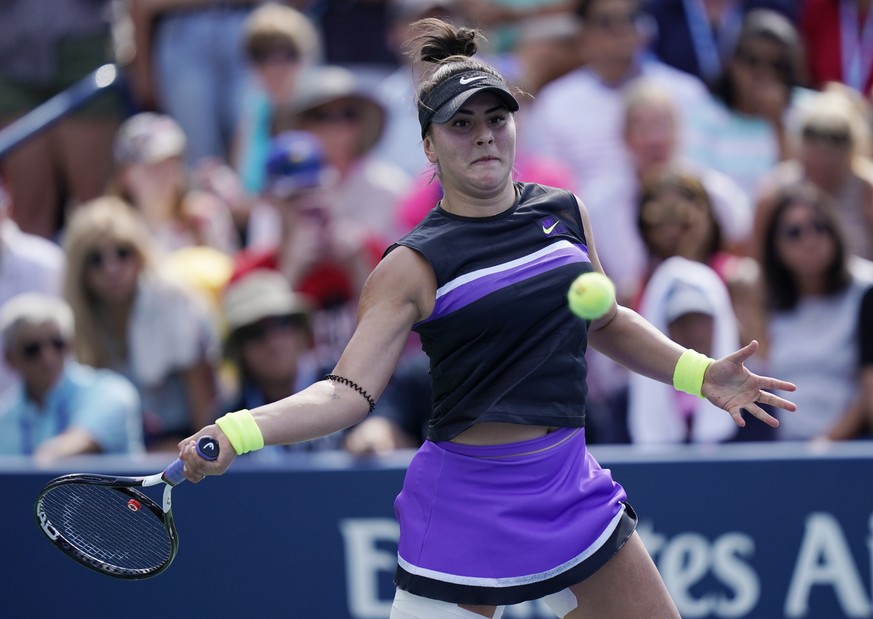 epa07802640 Bianca Andreescu of Canada hits a return to Kirsten Flipkens of Belgium during their match on the fourth day of the US Open Tennis Championships the USTA National Tennis Center in Flushing ...