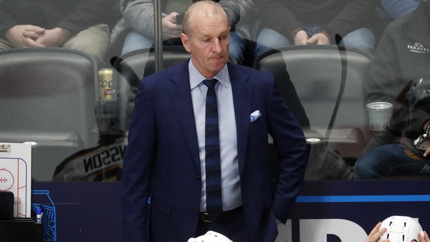 Buffalo Sabres head coach Ralph Krueger looks on in the first period of an NHL hockey game against the Colorado Avalanche Wednesday, Feb. 26, 2020, in Denver. (AP Photo/David Zalubowski)
r m