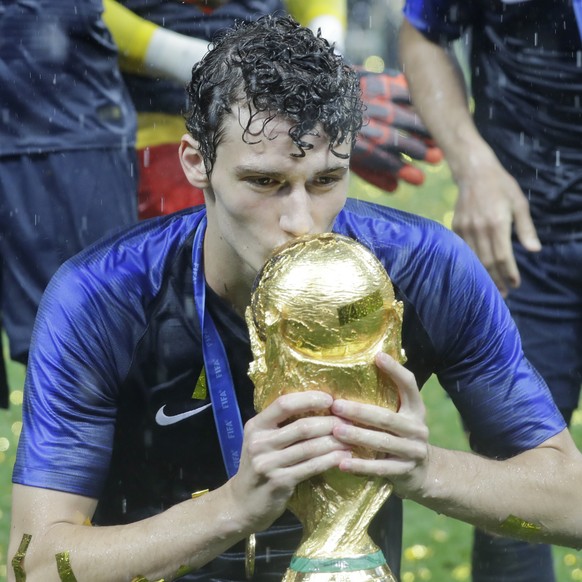 France&#039;s Benjamin Pavard kisses the trophy at the end during the final match between France and Croatia at the 2018 soccer World Cup in the Luzhniki Stadium in Moscow, Russia, Sunday, July 15, 20 ...