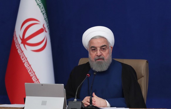 epa08797773 A handout photo made available by the Presidential Office of Iran shows Iranian President Hassan Rouhani speaking during a cabinet meeting in Tehran, Iran, 04 November 2020. According to m ...