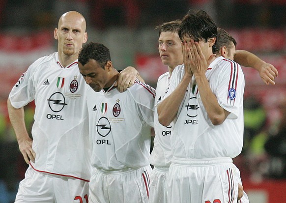 AC Milan&#039;s Jaap Stam, Cafu, Jon Dahl Tomasson and Kaka, from left, react during a penalty shootout at the end of the UEFA Champions League Final between AC Milan and Liverpool at the Ataturk Olym ...