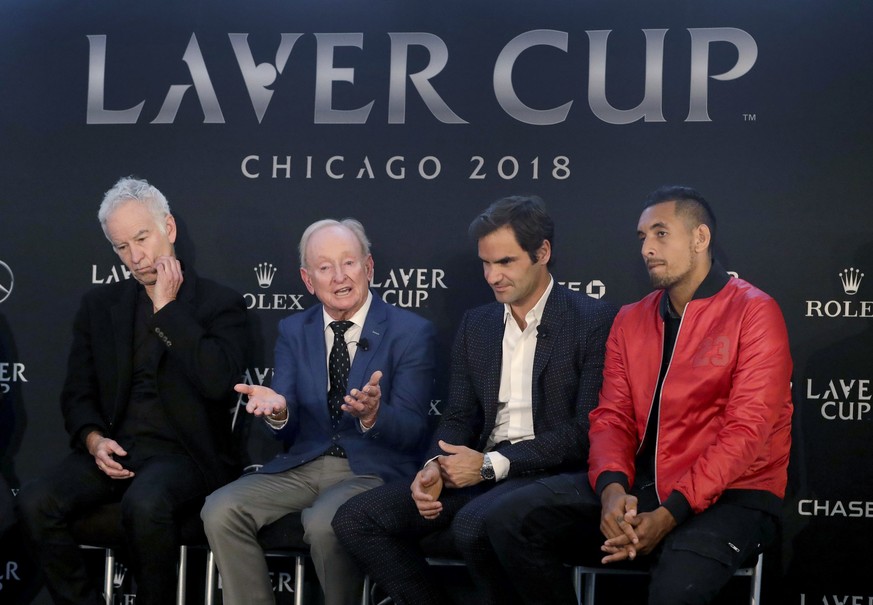 Rod Laver, second from left, responds to a question while promoting The Laver Cup tennis tournament with John McEnroe, left, Roger Federer and Nick Kyrgios, right, Monday, March 19, 2018, in Chicago.  ...