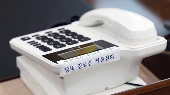 This photo provided by South Korea Presidential Blue House via Yonhap News Agency, shows a telephone hotline between South Korea and North Korea at the presidential Blue House in Seoul, South Korea, F ...
