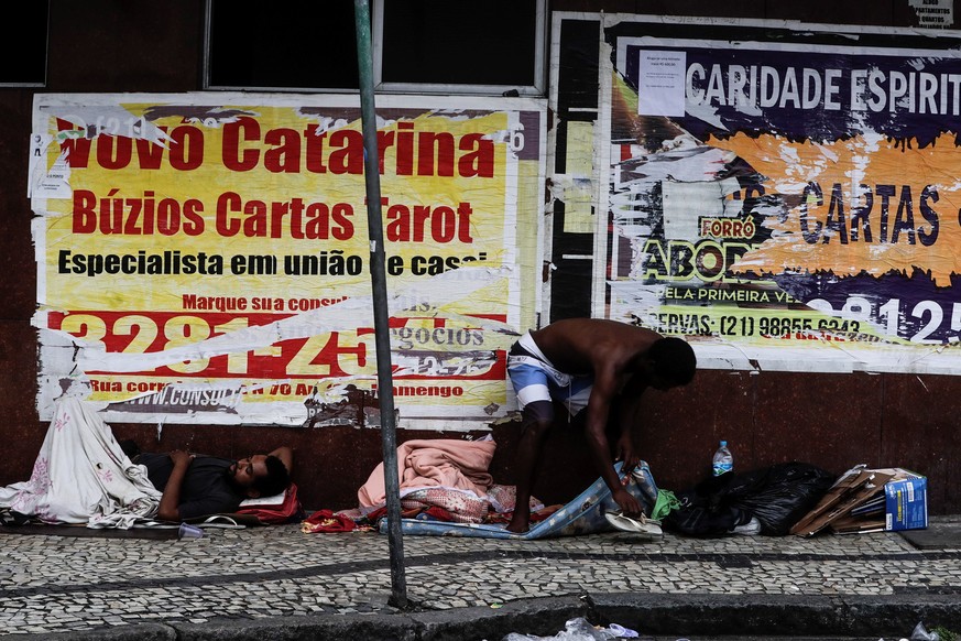 epa08332842 Homeless people in Rio de Janeiro, Brasil, 30 March 2020. The Rio de Janeiro Sambadrome, the iconic stage every year for the carnival parades, is being set up to welcome homeless people wh ...