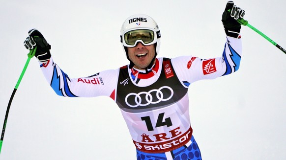 France&#039;s Johan Clarey celebrates at the end of a men&#039;s super G, at the ski World Championships in Are, Sweden, Wednesday, Feb. 6, 2019. (AP Photo/Giovanni Auletta)