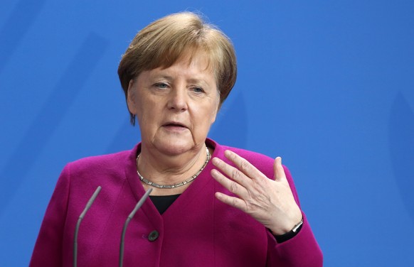 epa08353406 German Chancellor Angela Merkel speaks about the government&#039;s response to the coronavirus (COVID-19) pandemic in Berlin, Germany, 09 April 2020. While public support for the measures  ...